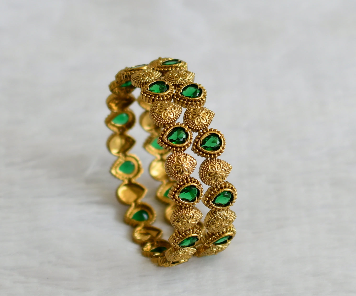 Antique gold tone bottle green thilak stone bangles(2.8) dj-50898