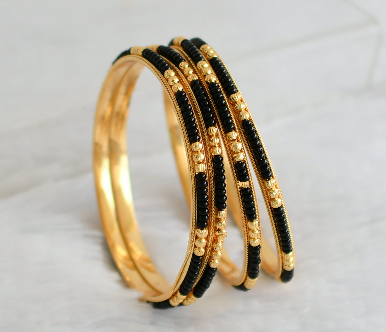 Gold tone karimani set of 4 bangles(2.4) dj-50969