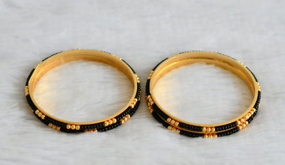 Gold tone karimani set of 4 bangles(2.6) dj-50970
