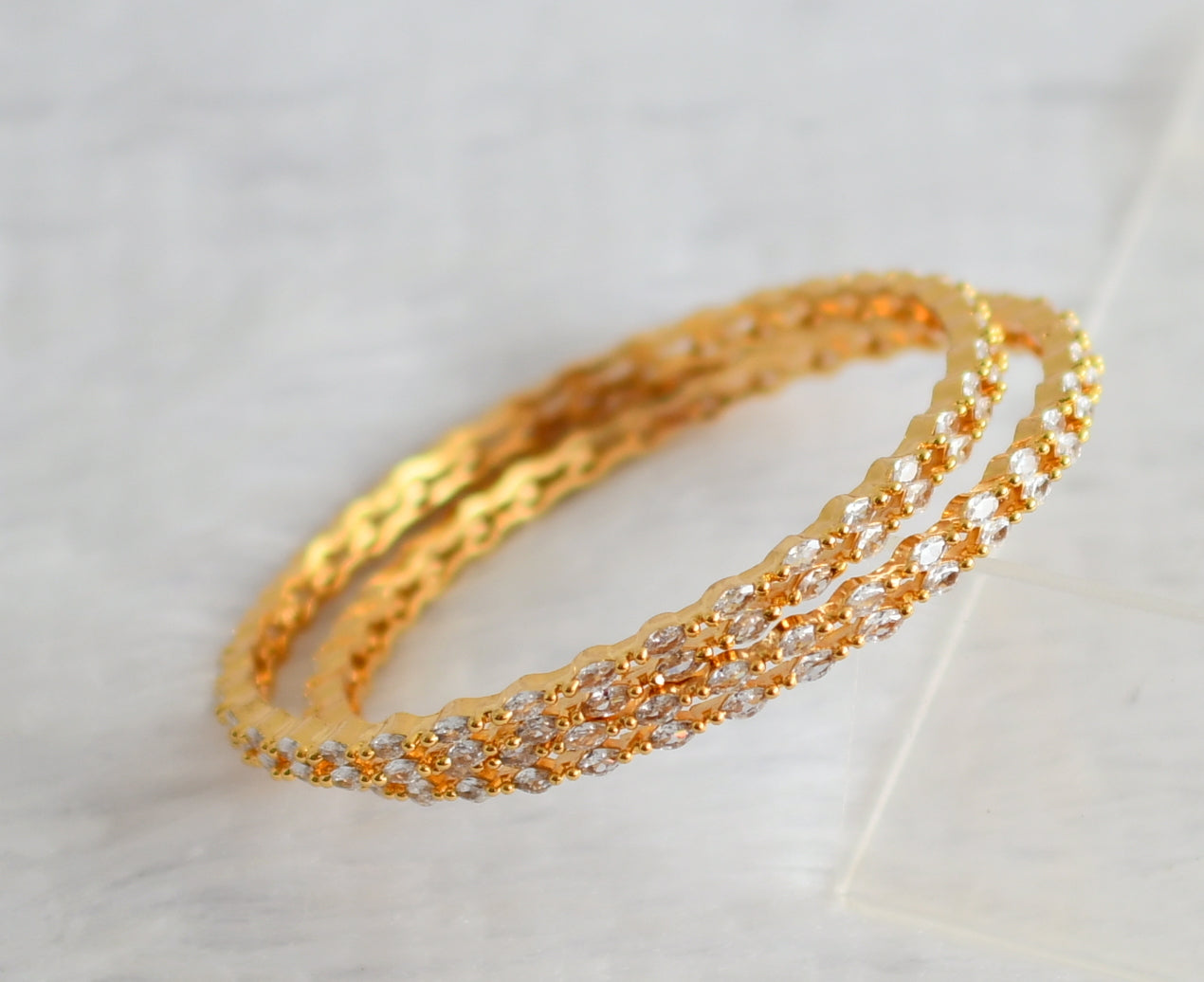 Gold tone cz white stone bangles(2.6) dj-50960