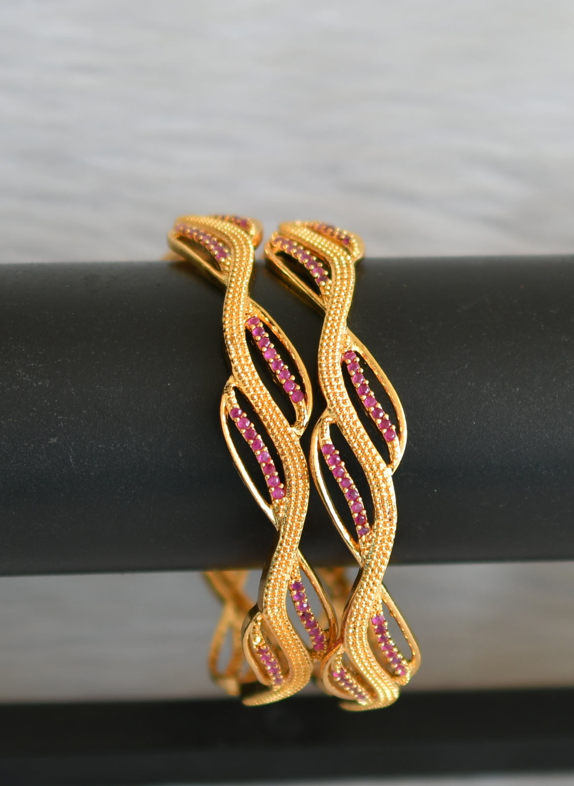 Gold tone ruby bangles (2.4) dj-42480