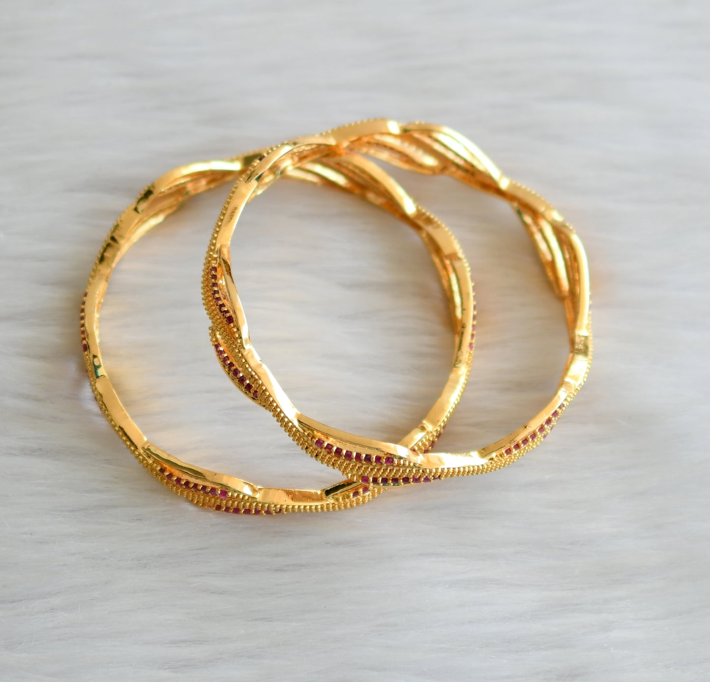 Gold tone ruby bangles (2.4) dj-42480