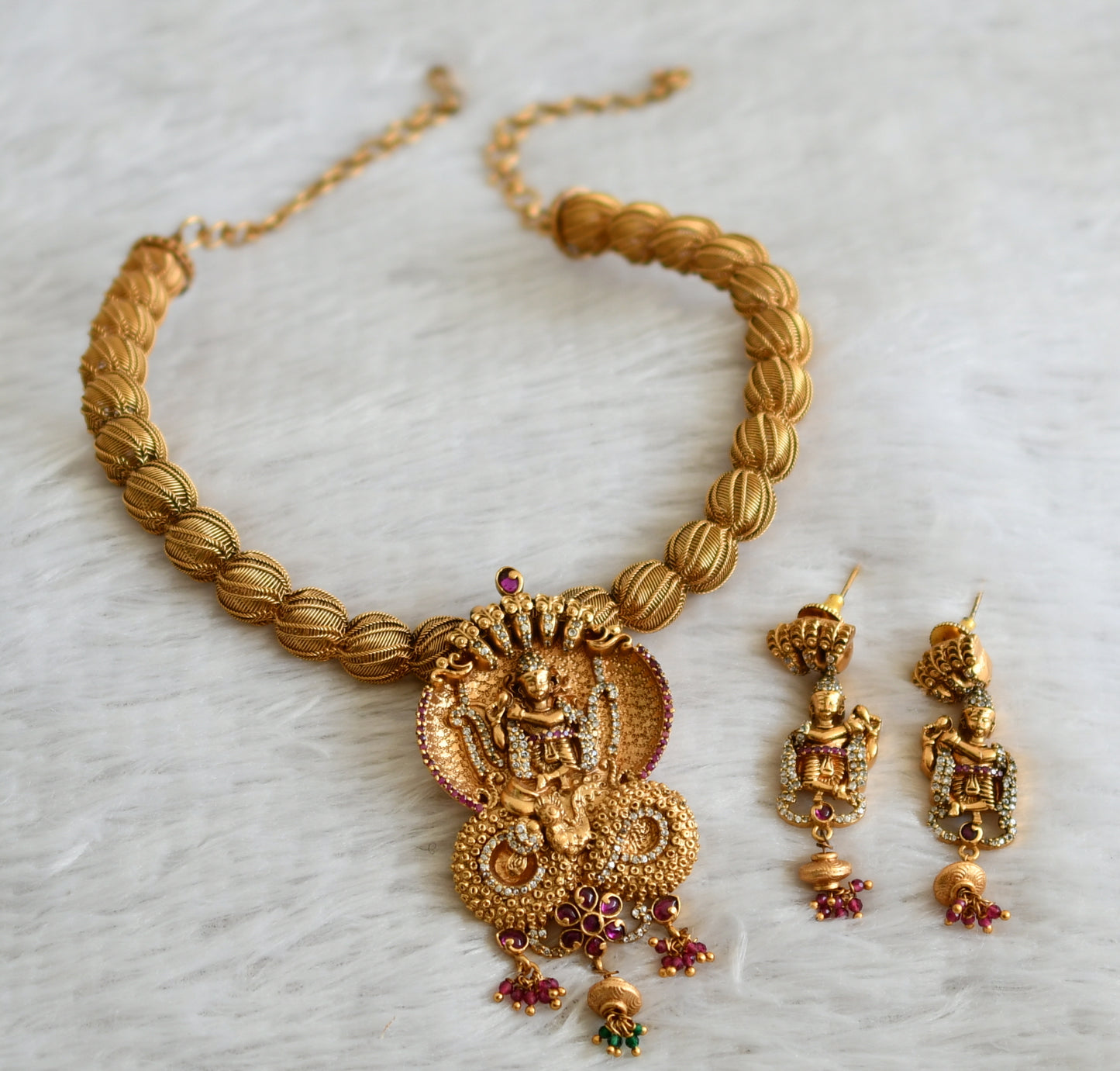 Matte finish cz kemp-ruby stone kalinga narthana krishna necklace set dj-48987