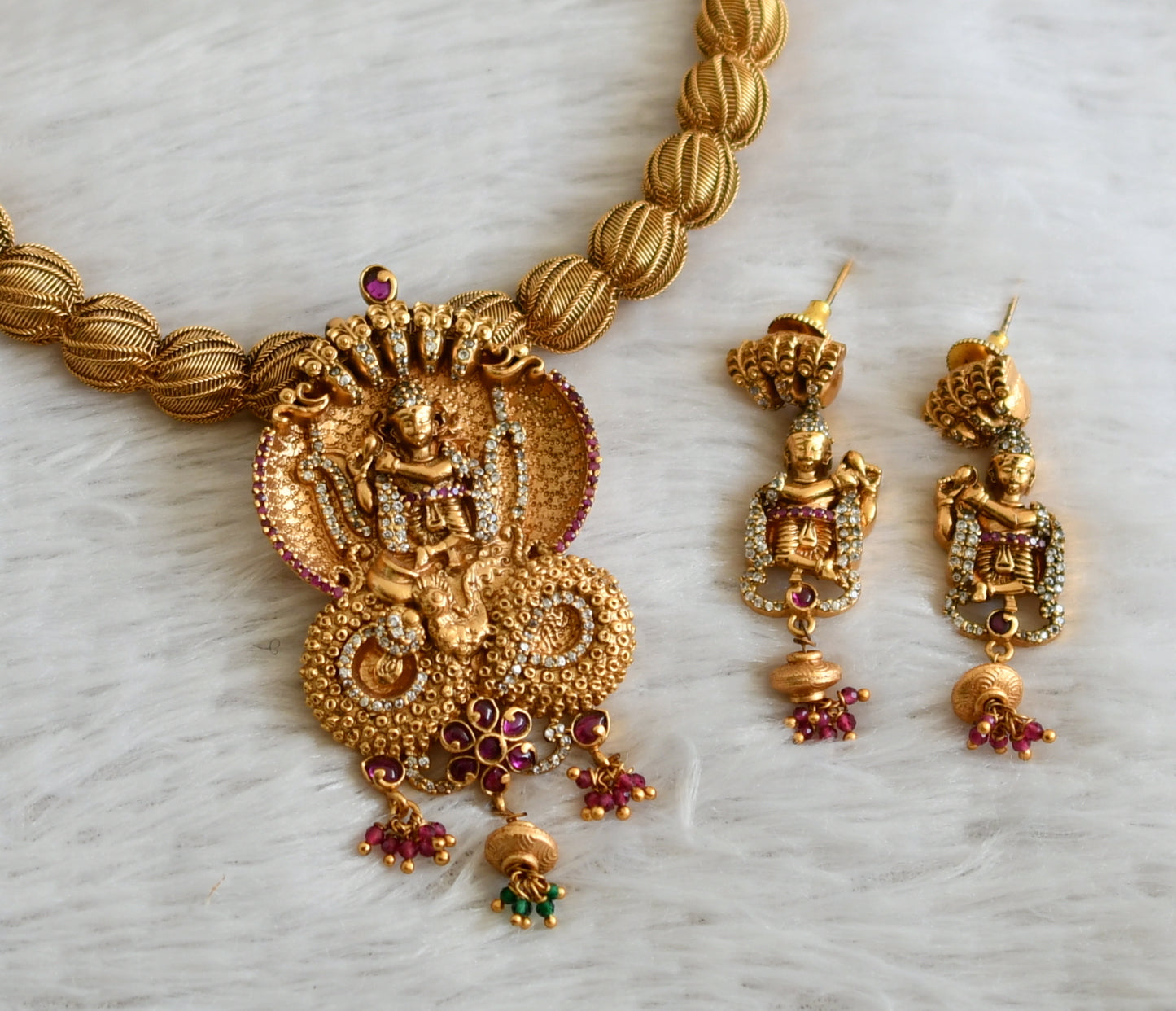 Matte finish cz kemp-ruby stone kalinga narthana krishna necklace set dj-48987