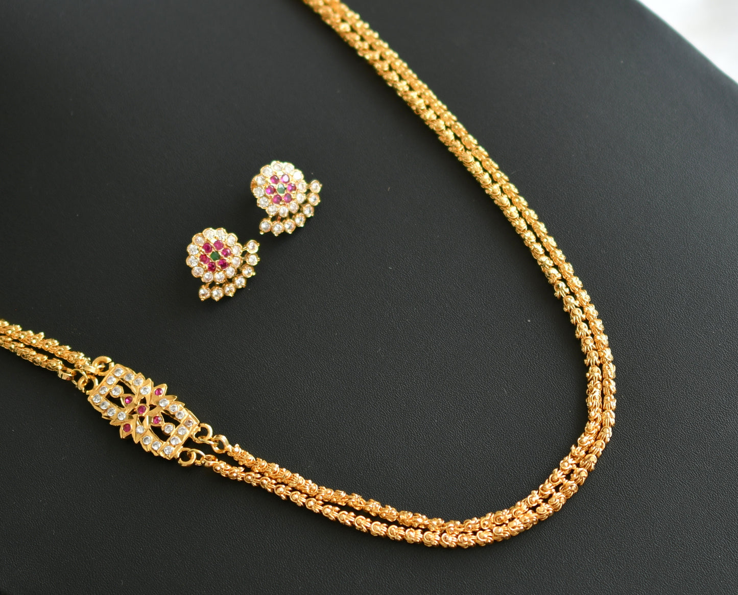 Gold tone ruby-white-green stone double layer mugappu chain with earrings dj-42514