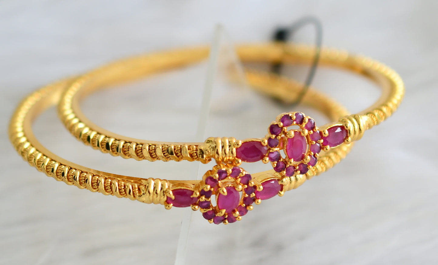 Gold tone pink flower bangles (2.10) dj-31281