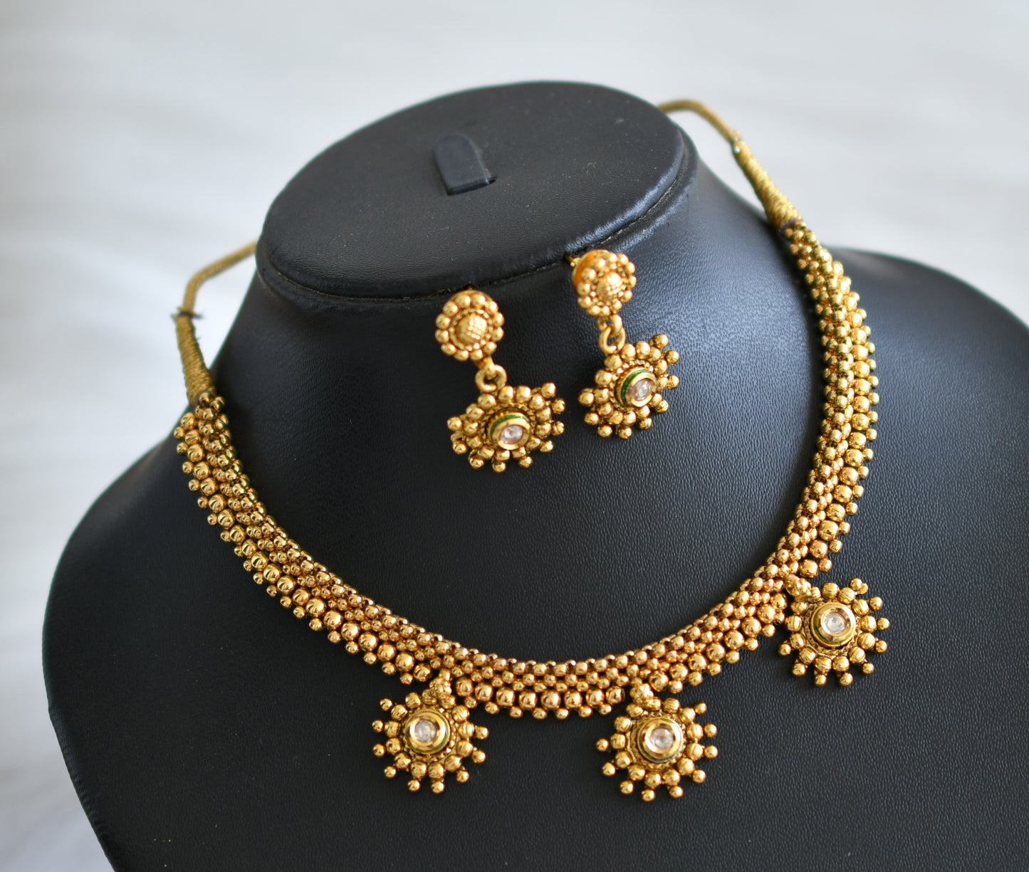 Antique gold tone kundan white necklace set dj-03923