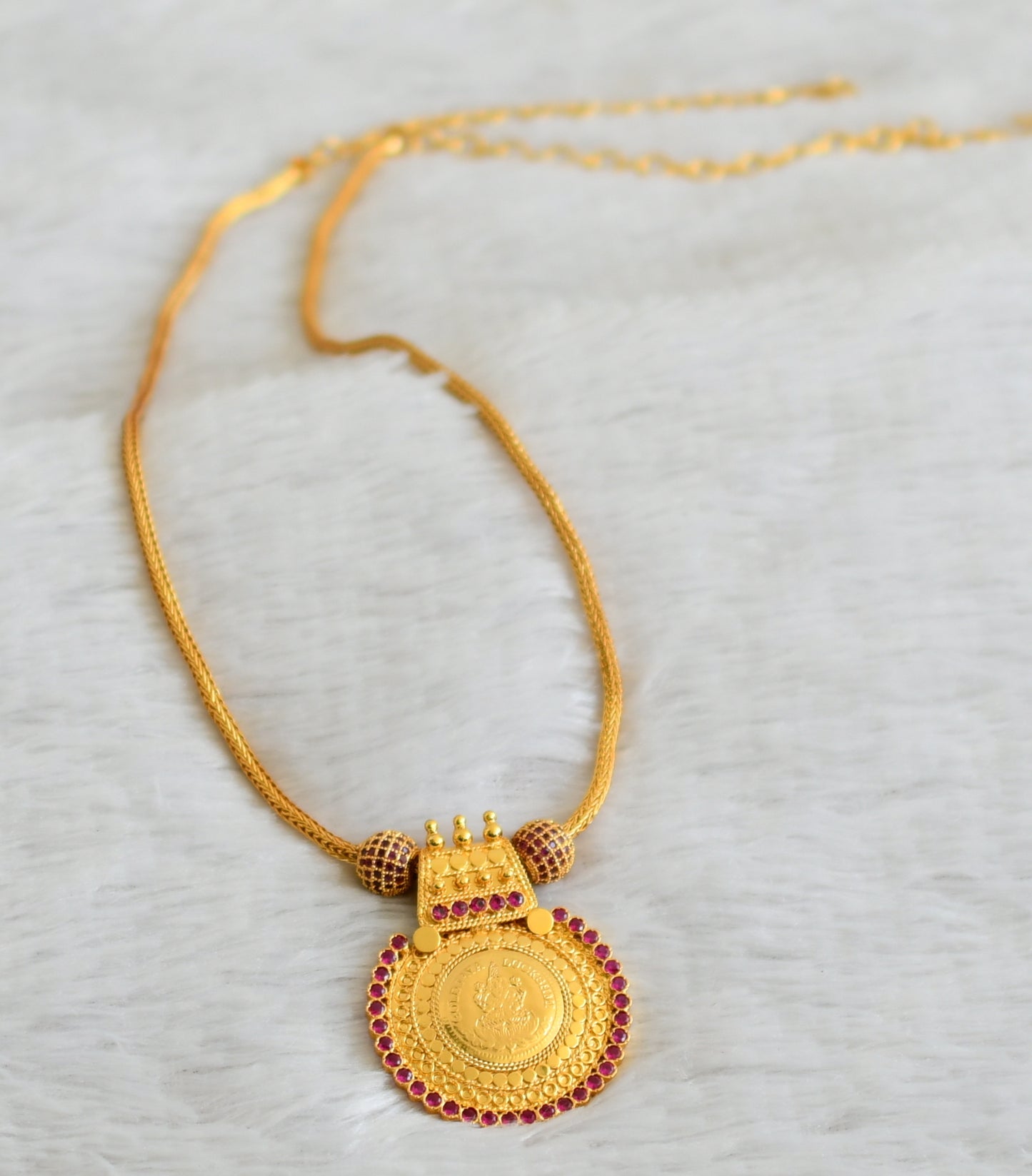 Gold tone pink stone lakshmi round pendant chain dj-49105