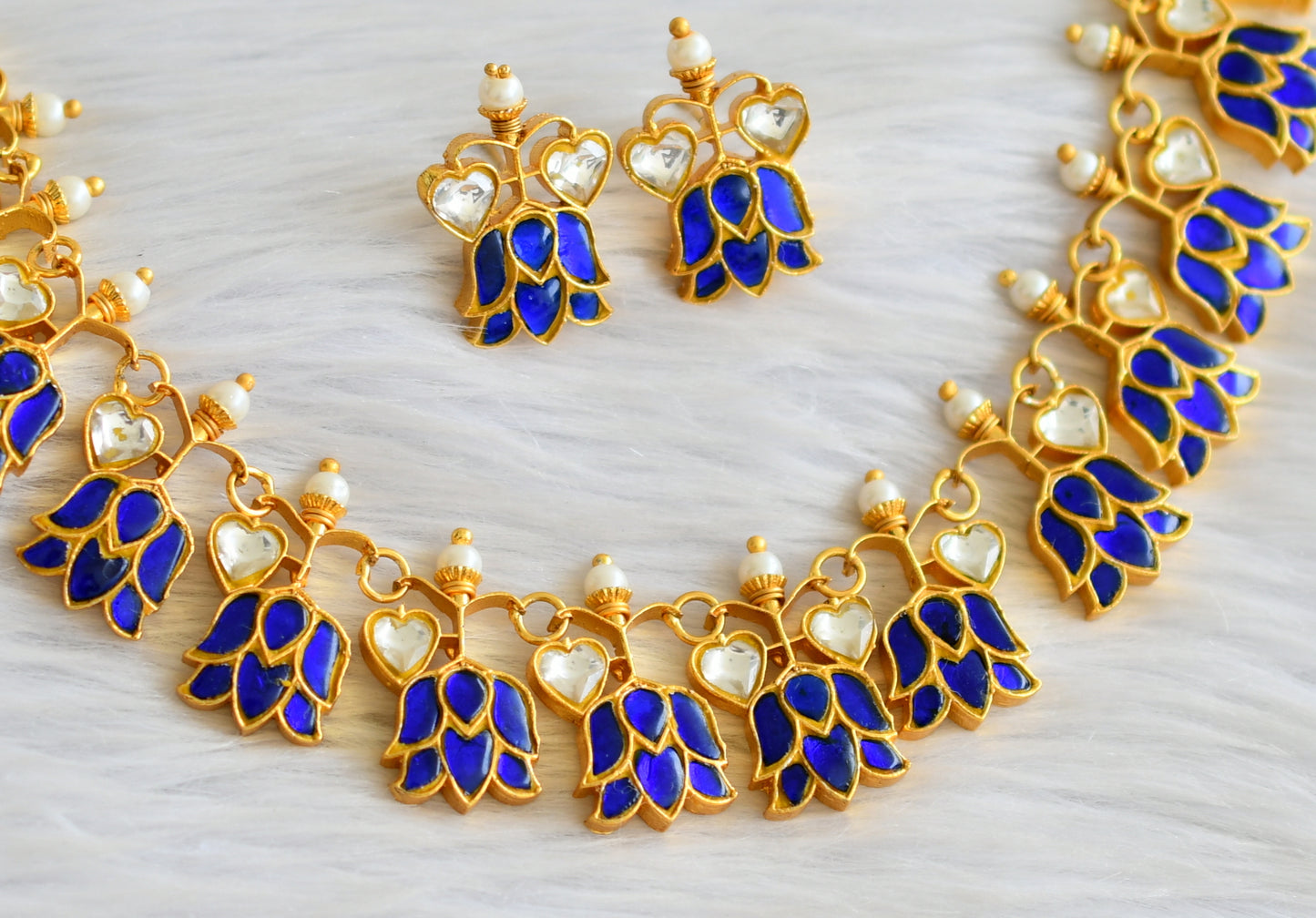 Gold tone blue-white kundan jadau lotus heart necklace set dj-43929