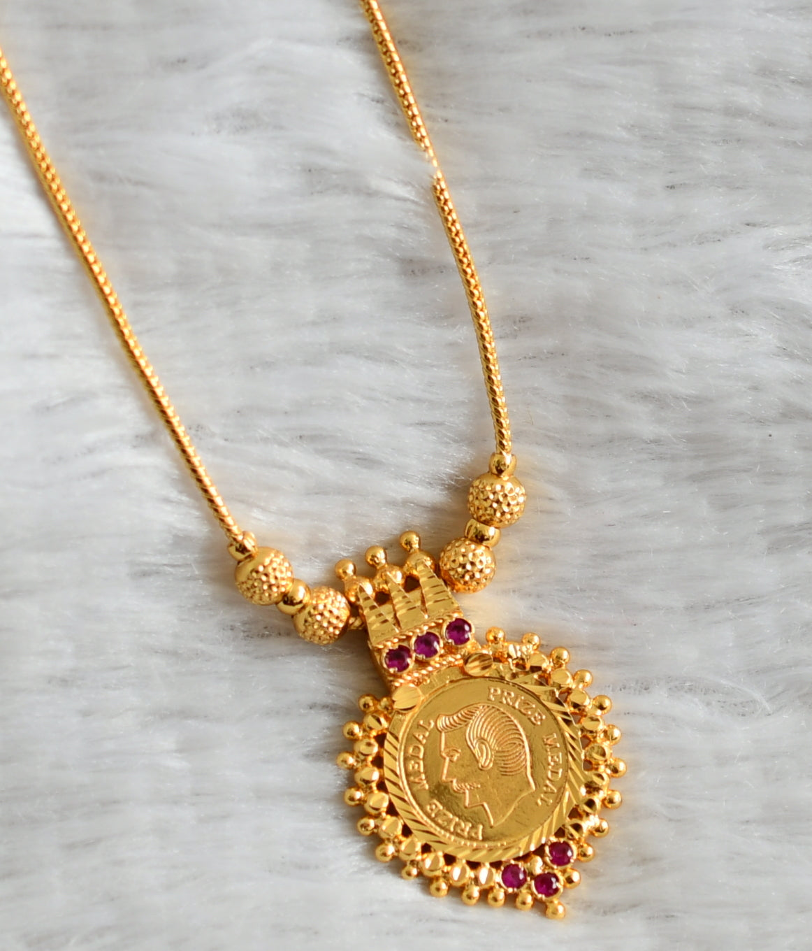 Gold tone pink stone head coin kodi necklace dj-49117