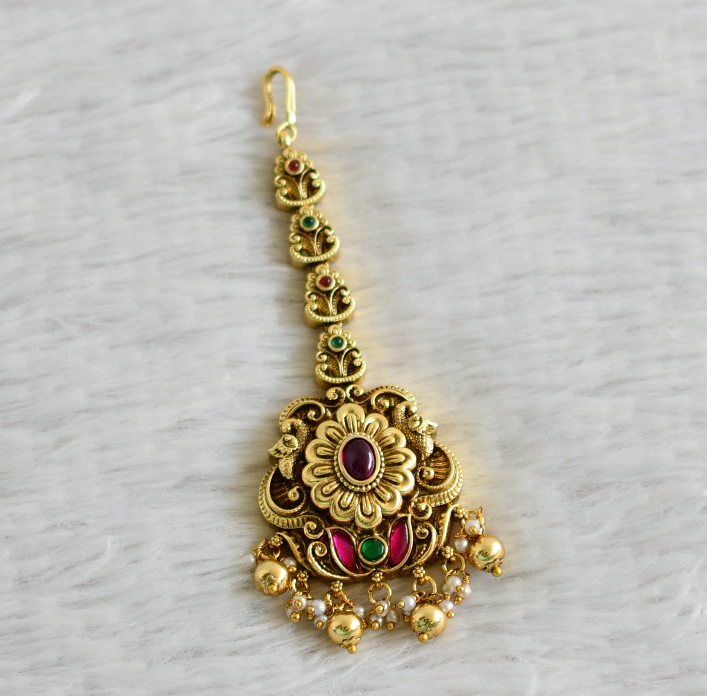 Antique gold tone pink-green kundan jadau flower peacock tikka dj-49158