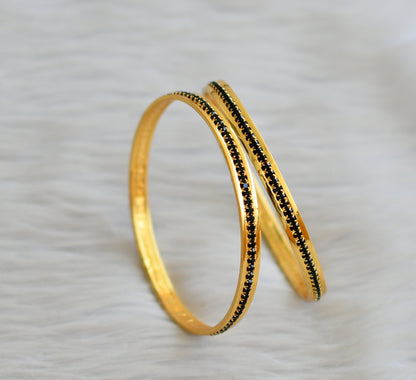 Gold tone black stone bangles(2.4) dj-43989