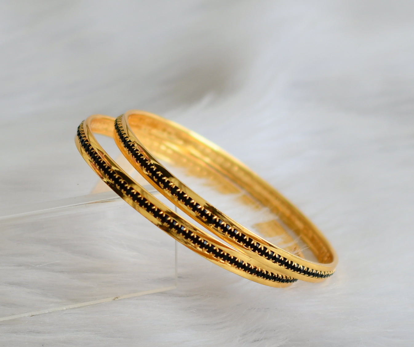 Gold tone black stone bangles(2.4) dj-43989