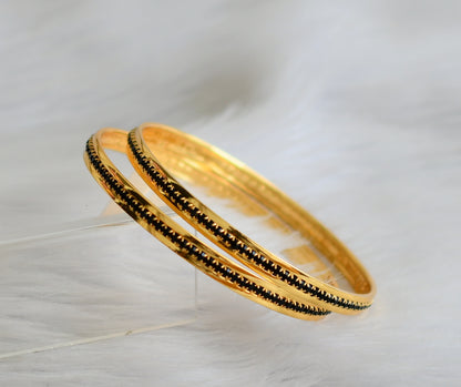 Gold tone black stone bangles(2.4) dj-43989