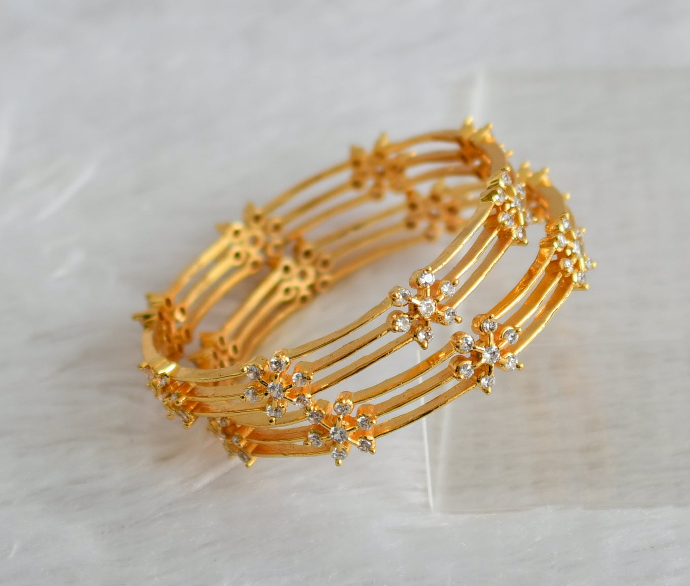 Gold tone cz white flower bangles(2.4) dj-47392