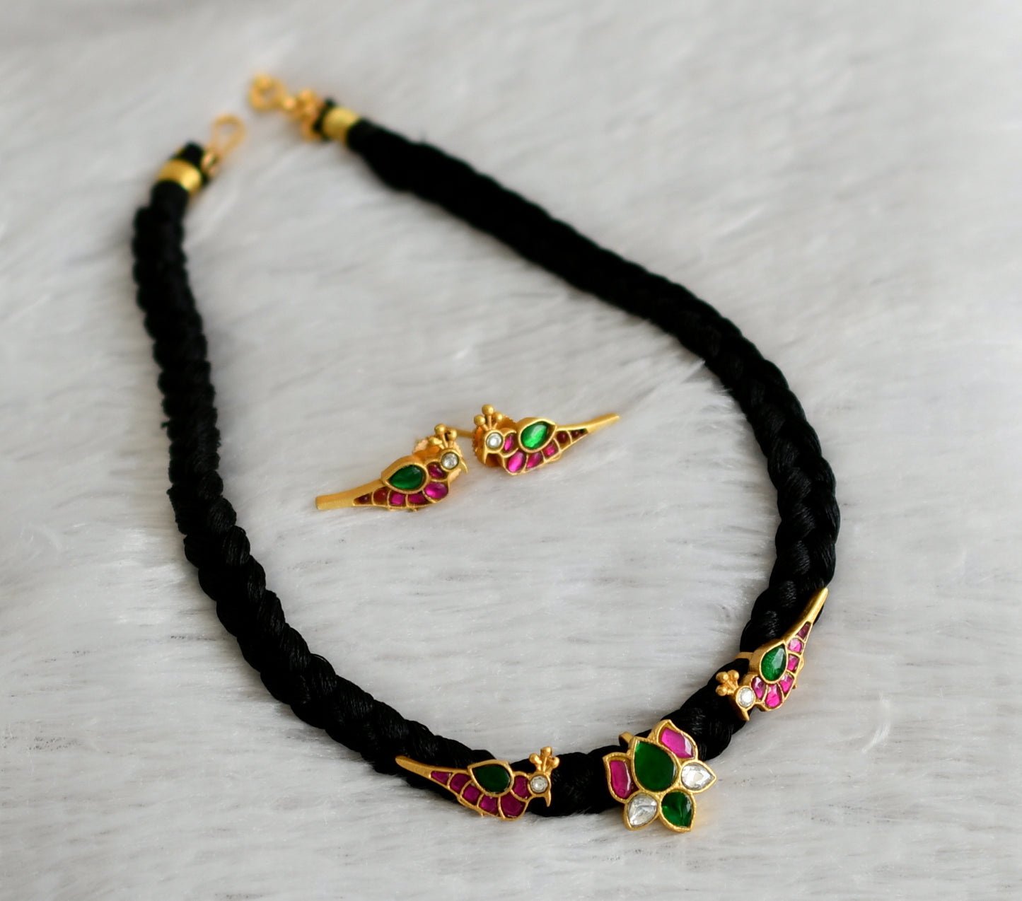 Gold tone black silk thread pink-green-white kundan jadau lotus bird necklace set dj-47432