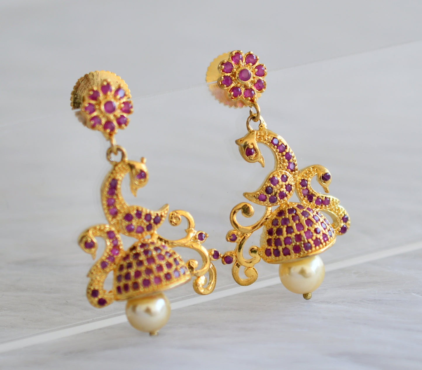 Gold tone ruby pearl peacock jhumkkas dj-04049