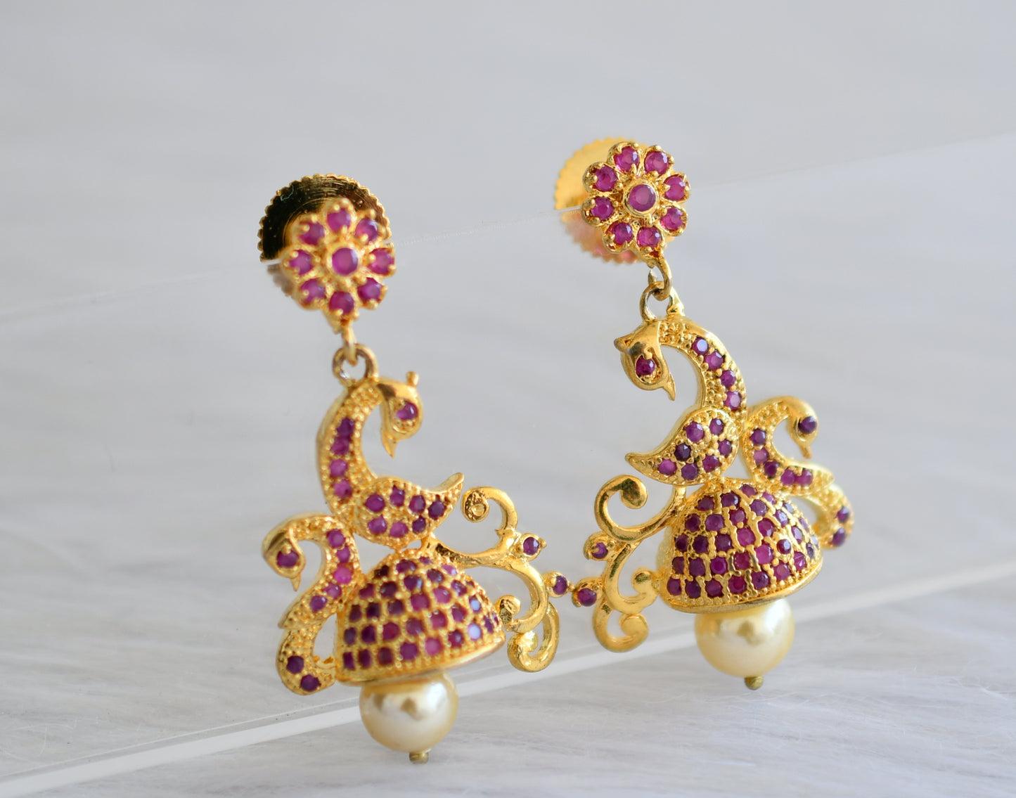 Gold tone ruby pearl peacock jhumkkas dj-04049