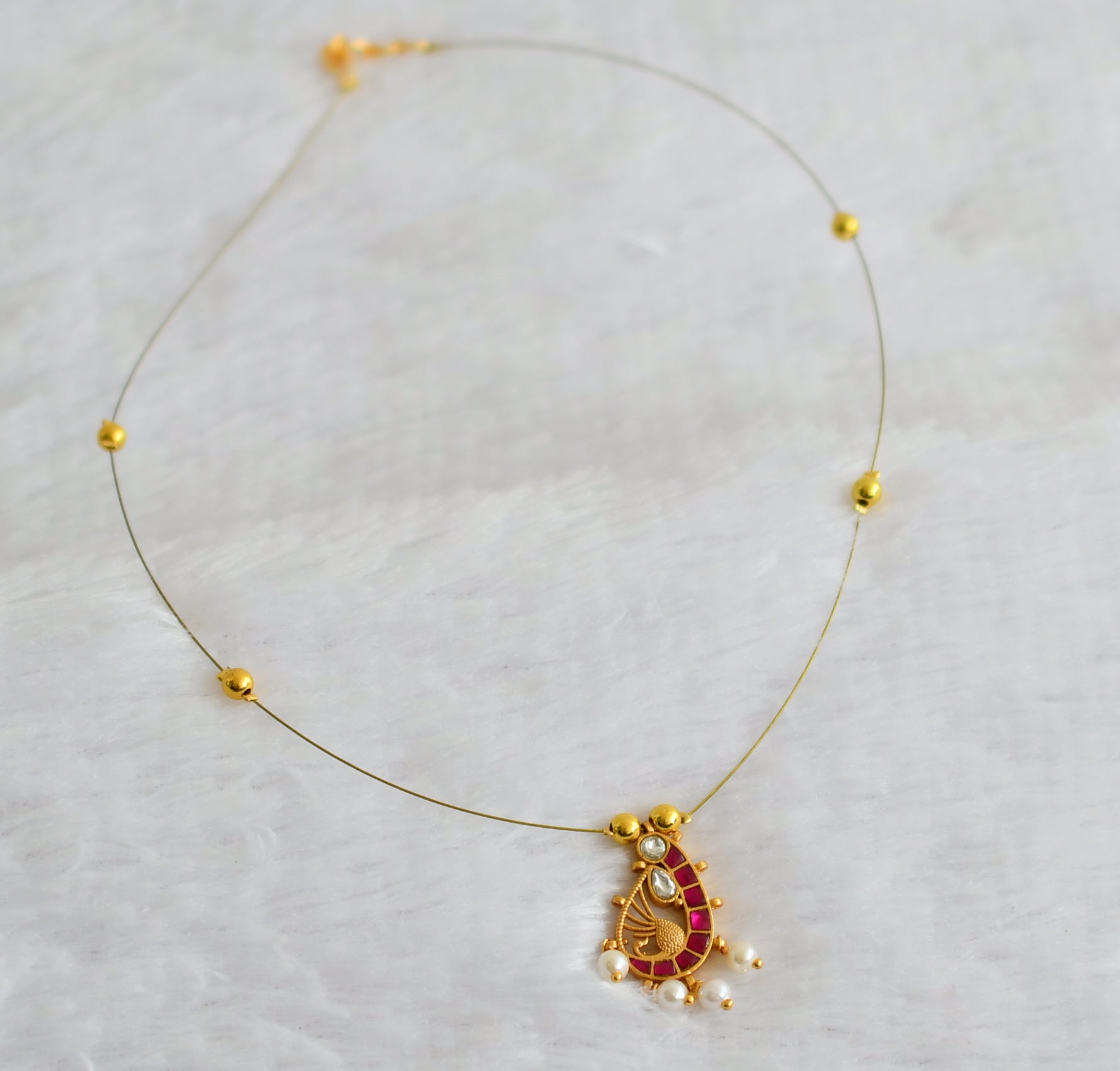 Gold tone pink-white kundan jadau pearl peacock invisible necklace Gold tone pink-white kundan jadau pearl peacock invisible necklace