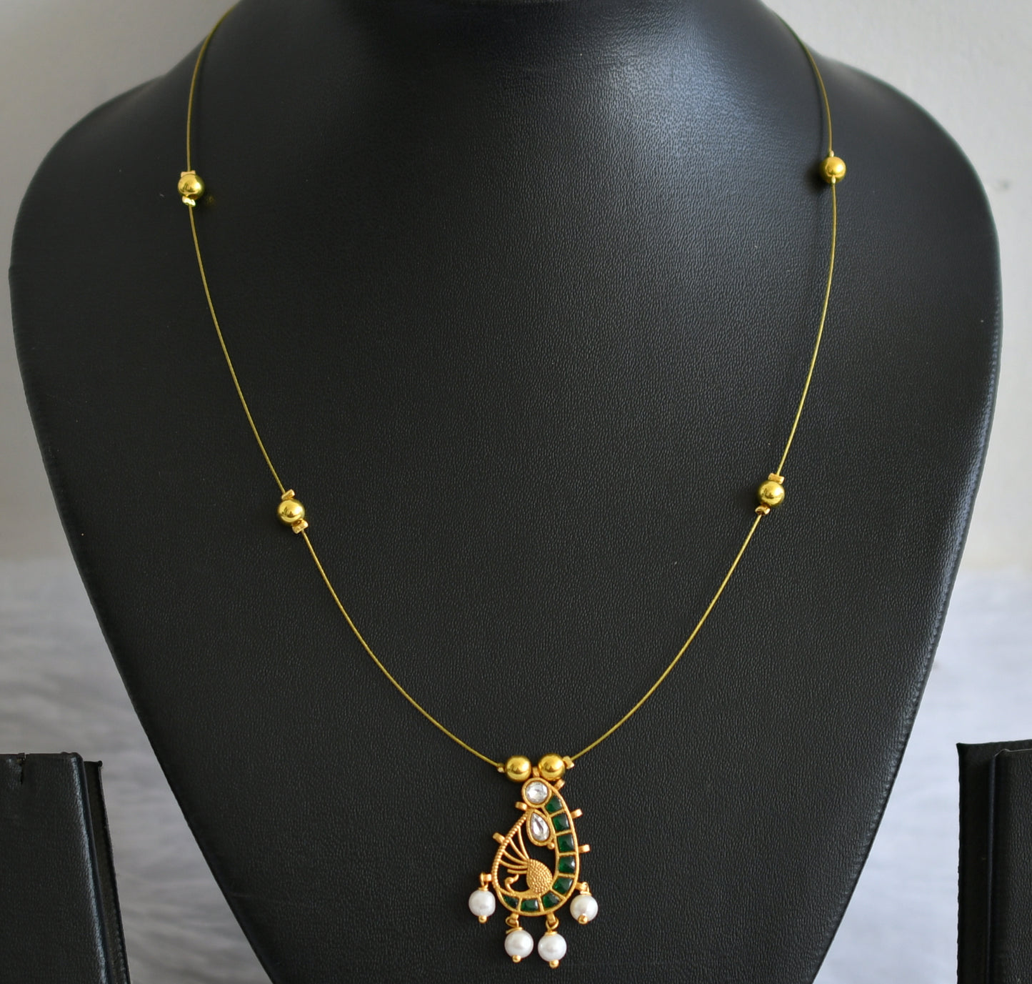 Gold tone green kundan jadau pearl peacock invisible necklace dj-49318