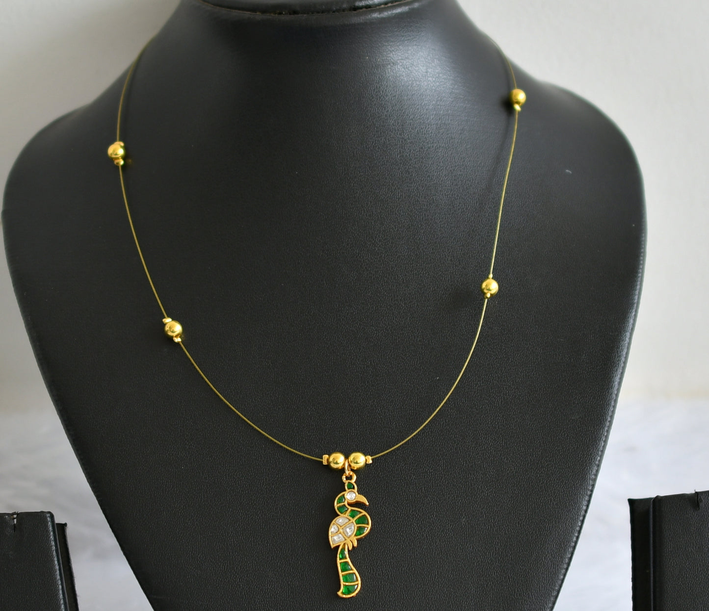 Gold tone green-white kundan jadau peacock invisible necklace dj-49332