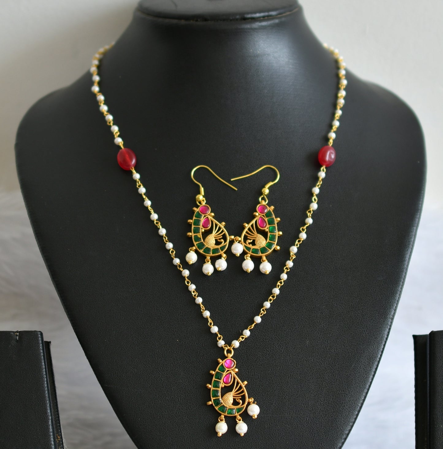 Gold tone 18 inches pearl chain with pink-green peacock kundan jadau pendant set dj-49377