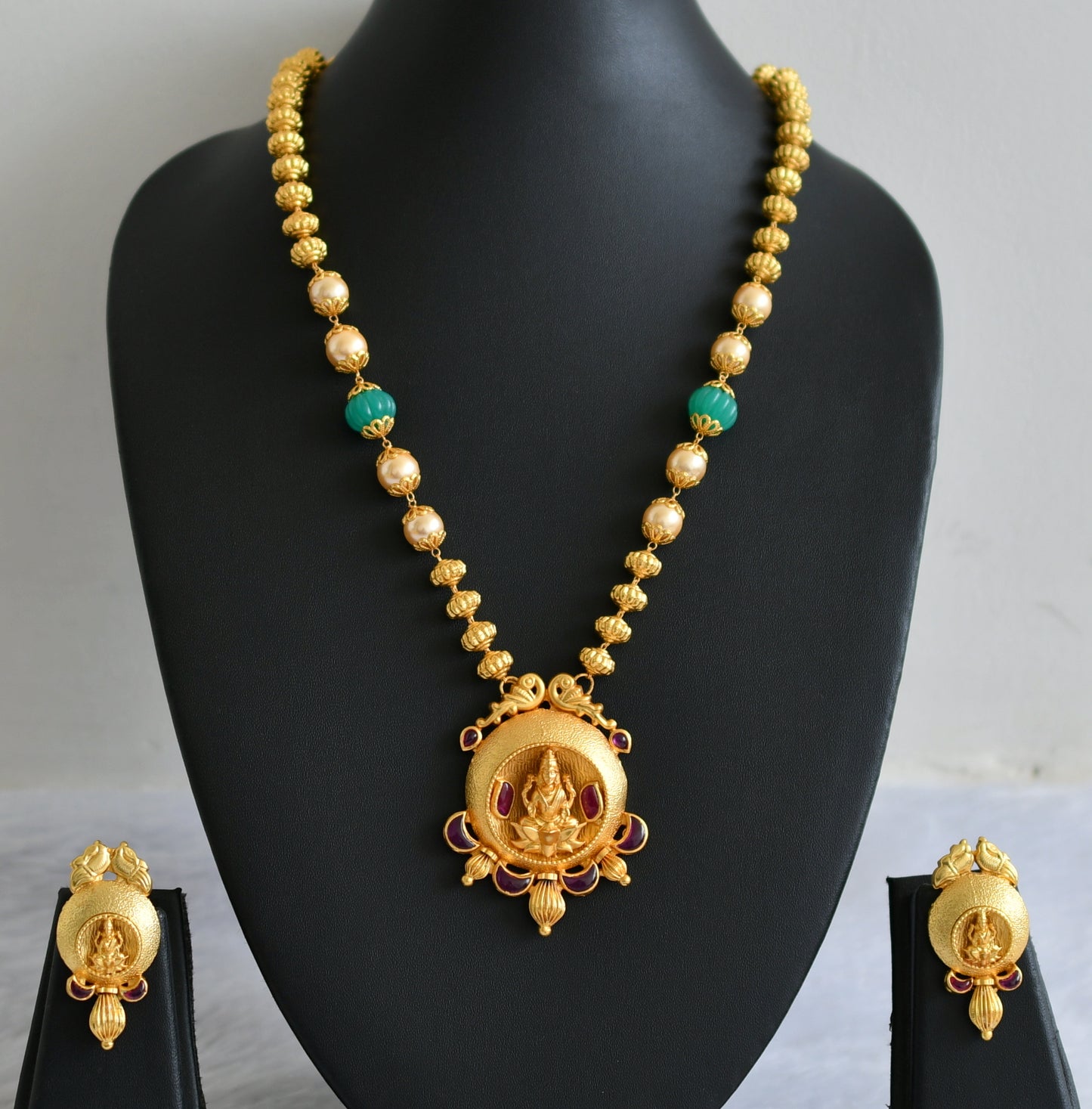 Gold tone uncut polki pink-pearl-green pumpkin beaded lakshmi necklace set dj-47525