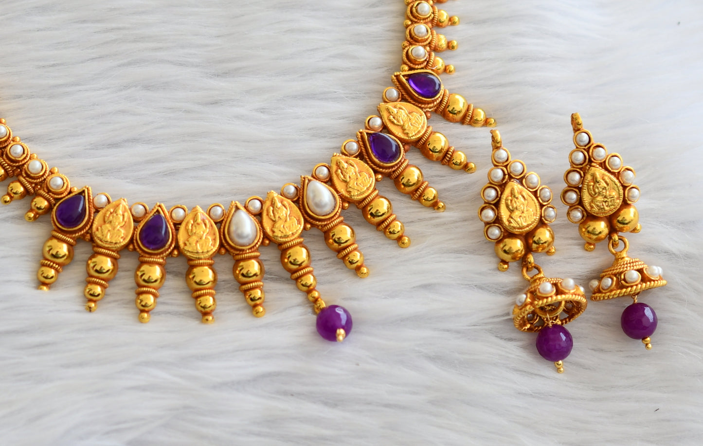 Gold tone purple-pearl stone lakshmi necklace set dj-45892