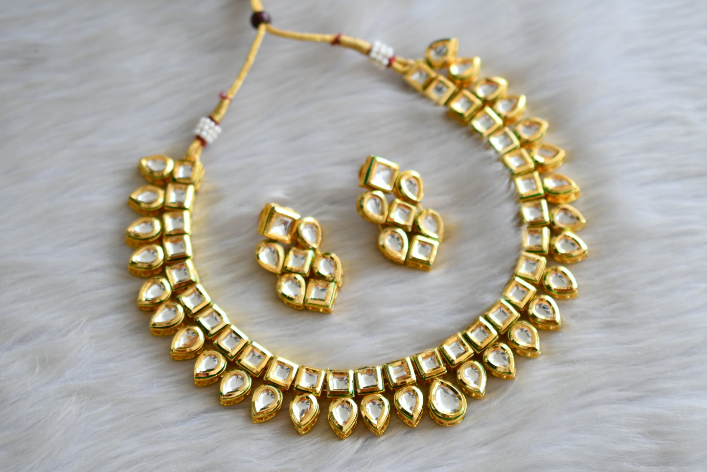 Gold tone white kundan necklace set dj-42763