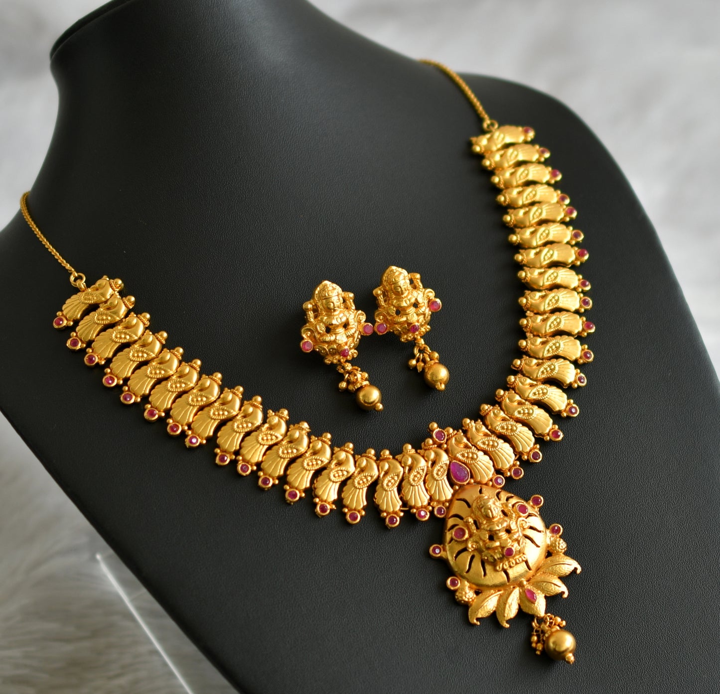 Gold tone ruby stone lakshmi peacock necklace set dj-47541