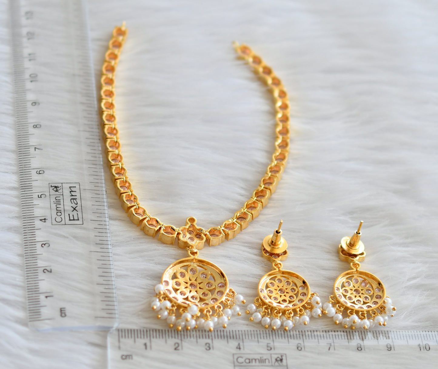 Gold tone ad baby pink south indian style attigai/necklace set dj-45884