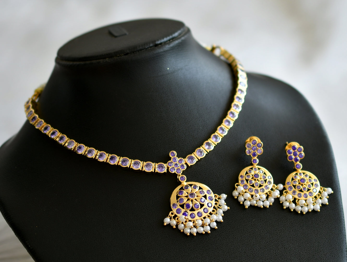Gold tone ad purple south indian style attigai/necklace set dj-45882