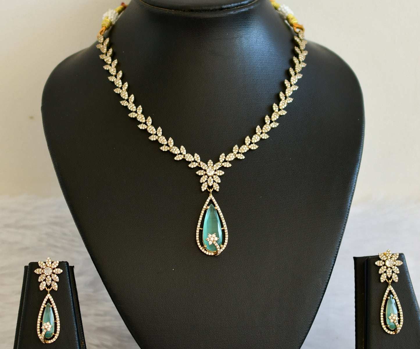 Antique cz-sea green thilka stone leaf necklace set dj-49427