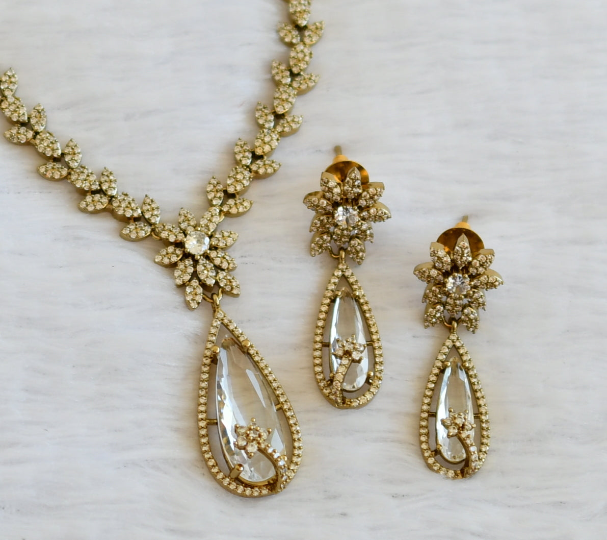 Antique cz white thilak stone leaf necklace set dj-49429