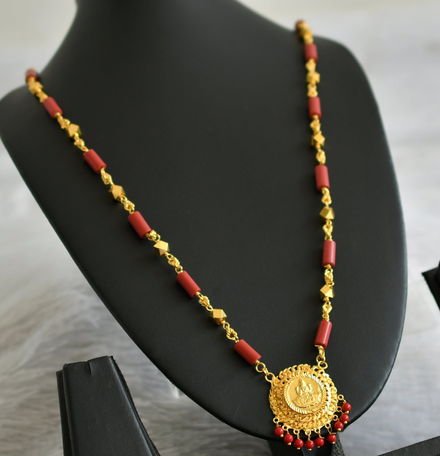 Gold tone 30 inches coral chain with lakshmi round pendant dj-47160