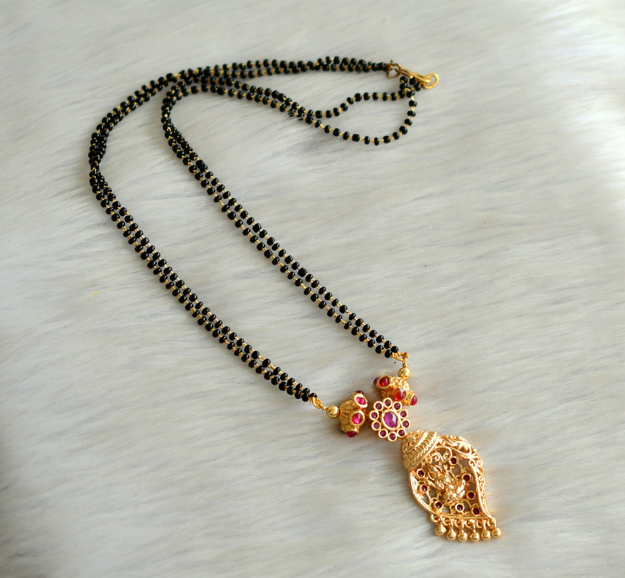 Gold tone pink stone lakshmi mangalsutra dj-42786 – dreamjwell