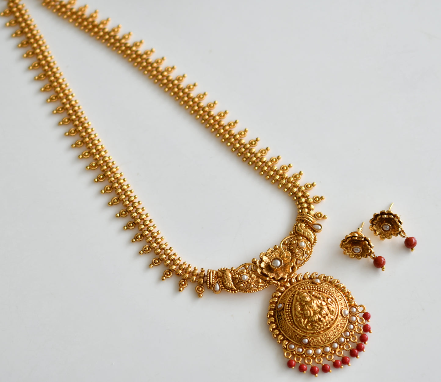 Antique gold tone pearl-coral Lakshmi haar set dj-42832