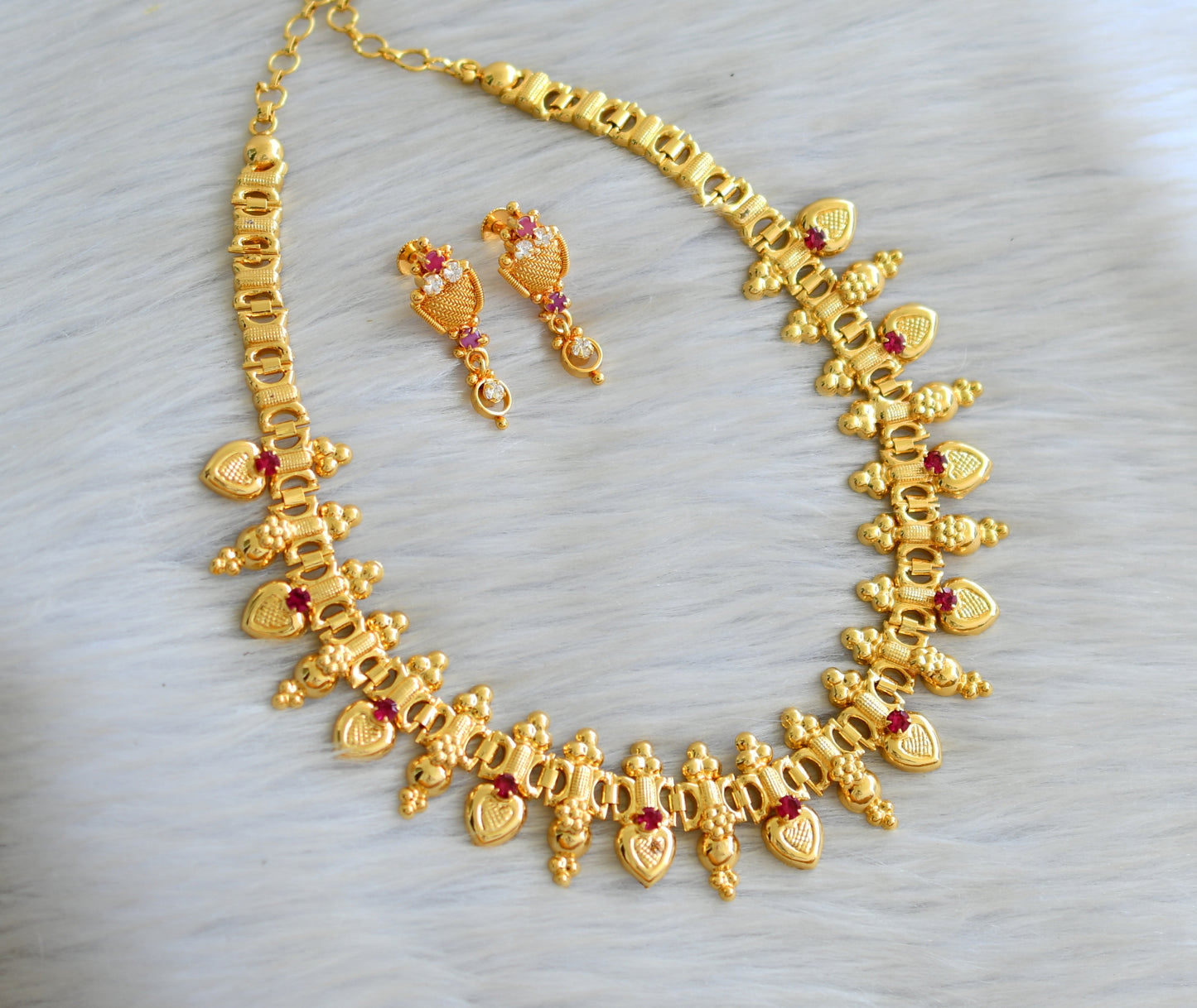 Gold tone pink stone heart kerala style necklace set dj-42840