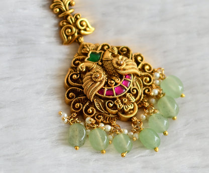 Antique gold tone pink-green kundan jadau green beaded nakshi peacock tikka dj-47732