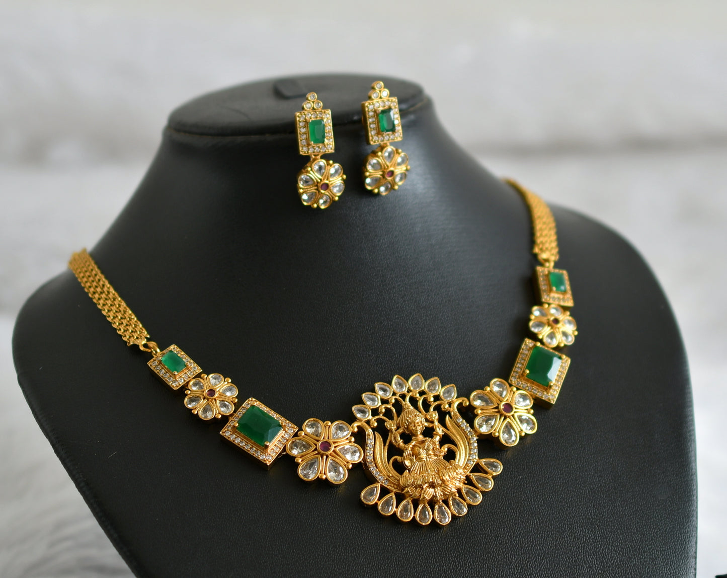 Matte finish cz ruby-green block stone lakshmi flower necklace set dj-47747