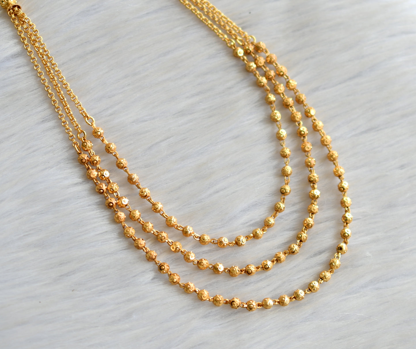 Gold tone multilayer designer ball necklace dj-42888