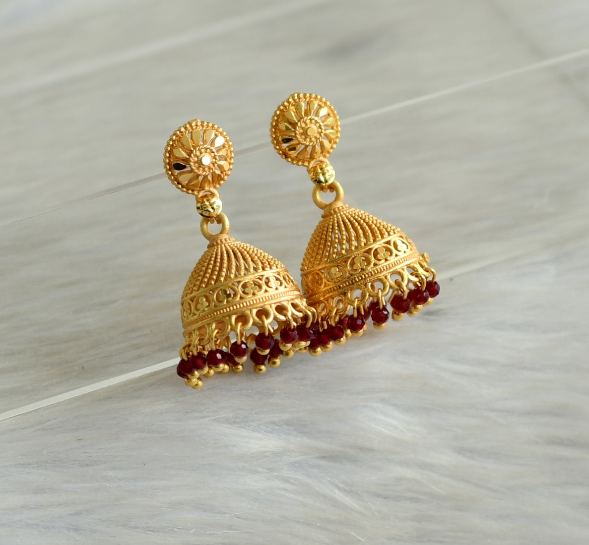 Matte gold tone kerala style maroon cluster jhumkka dj-42914