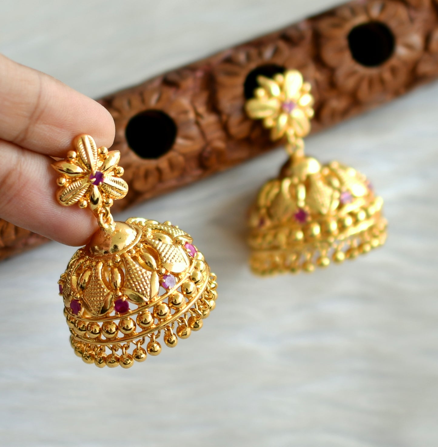 Gold tone kerala style pink stone jhumkka dj-42910