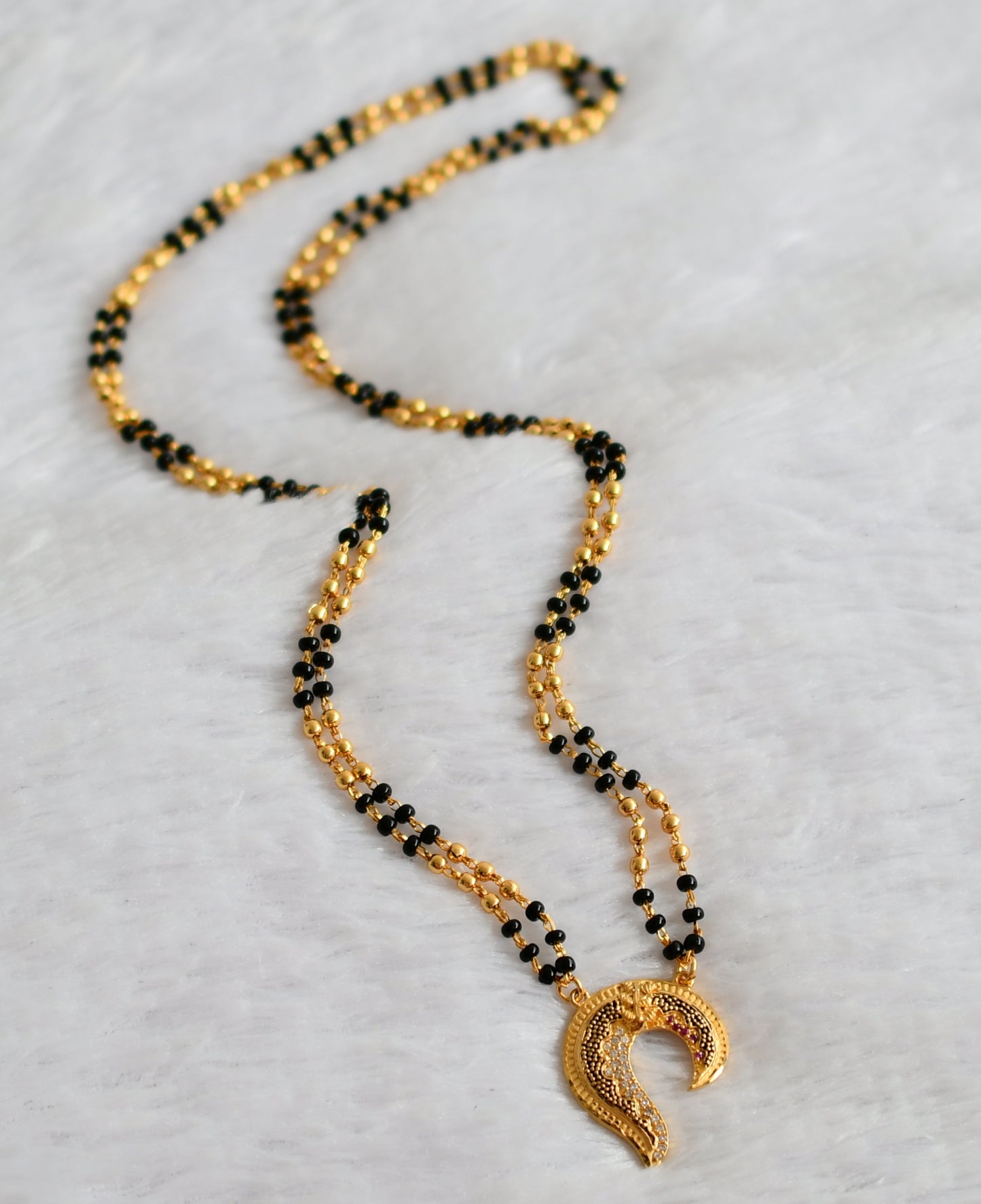 Gold tone 24 inches karimani chain with ruby-white stone pendant dj-49735