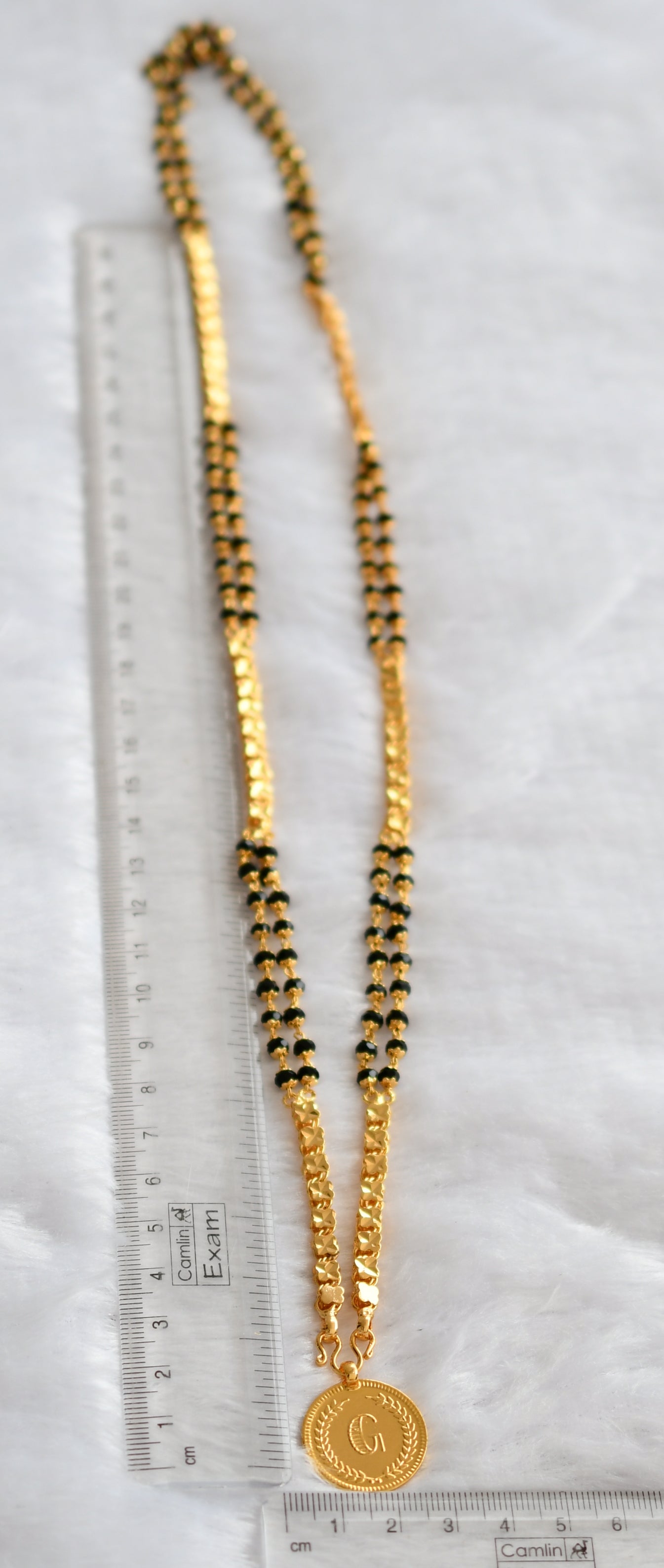 Gold tone 30 inches black karimani double layer chain with guruvayurappan coin pendant dj-46221