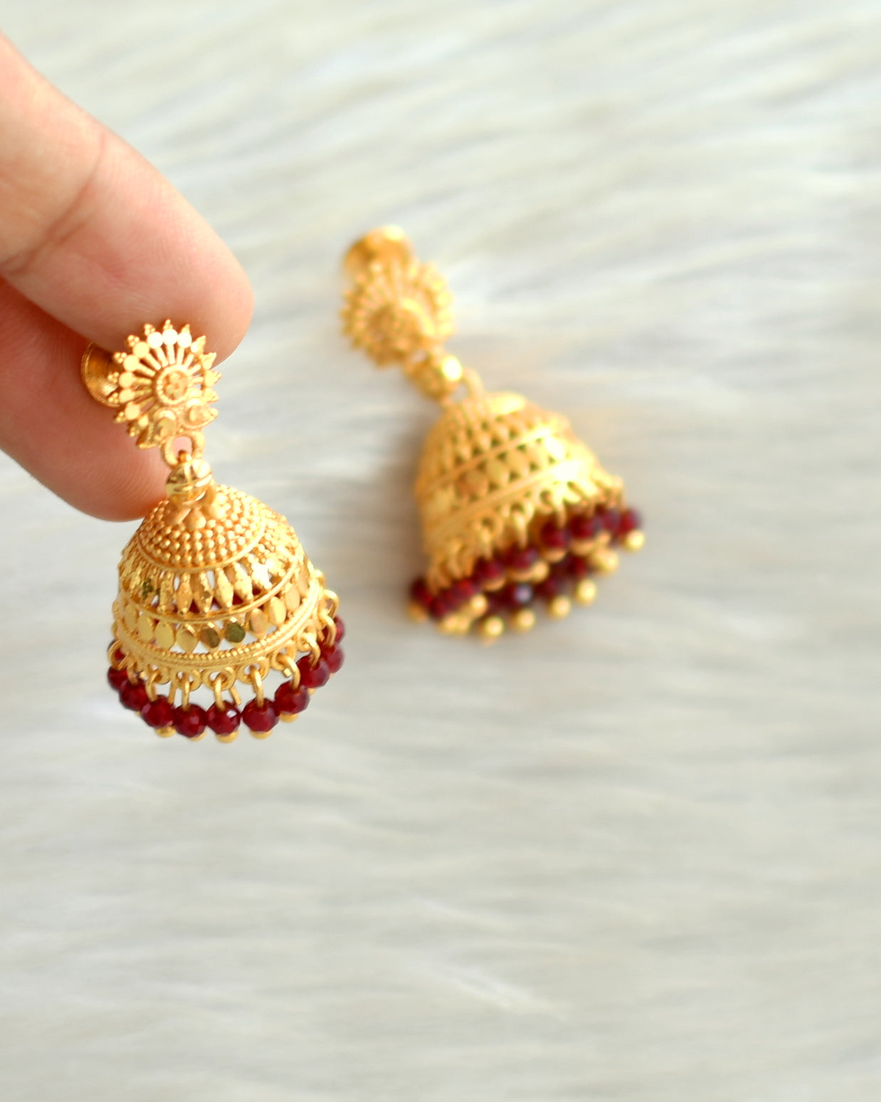 Matte gold tone kerala style maroon cluster jhumkka dj-42935