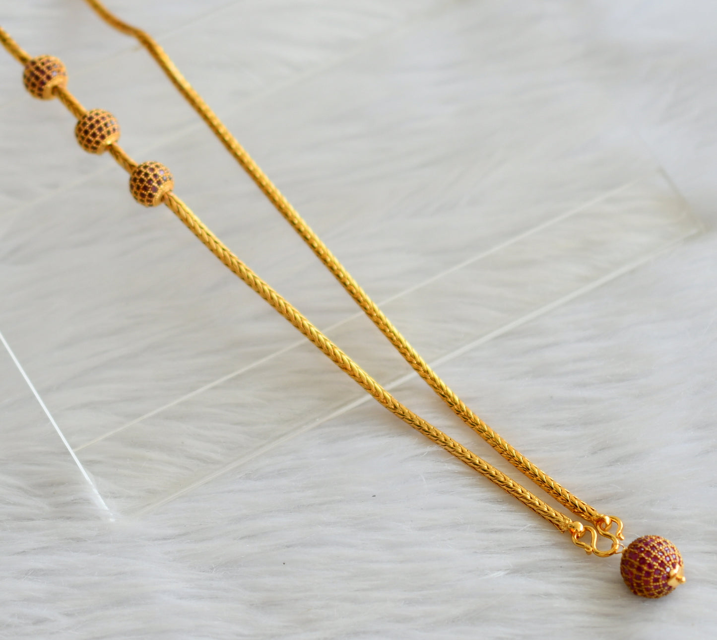Gold tone 24 inches ruby ball mugappu chain with ruby ball pendant dj-44424