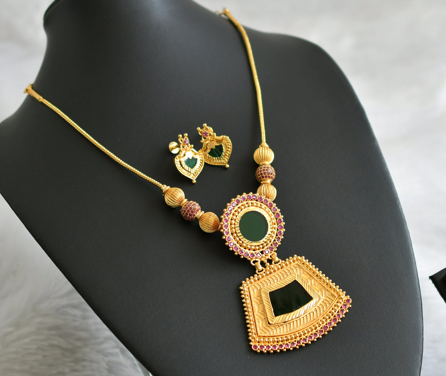 Gold tone kerala style ruby stone ball pink-green kodi necklace set dj-47838