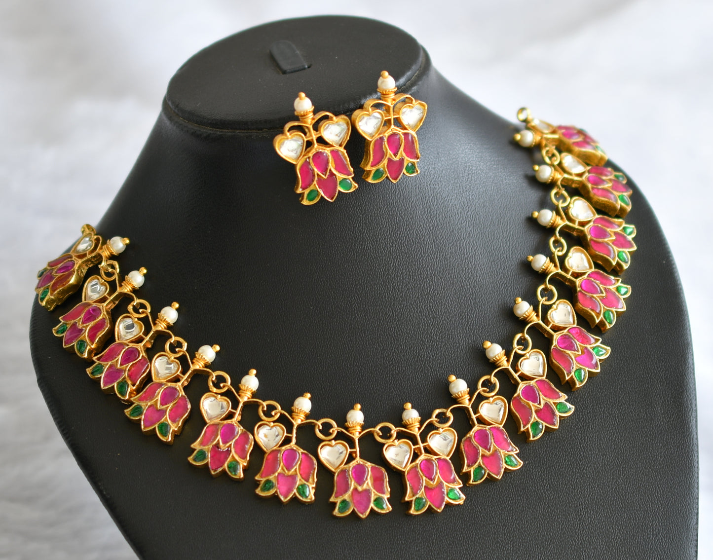 Gold tone pink-green-white pearl kundan jadau lotus heart necklace set dj-46251