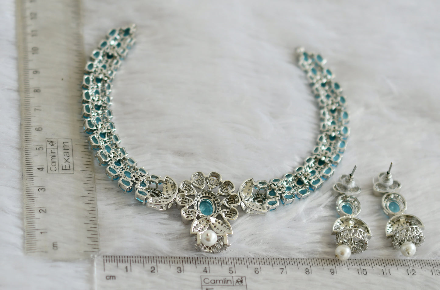 Silver tone cz sky blue-white oval stone flower necklace set dj-47862